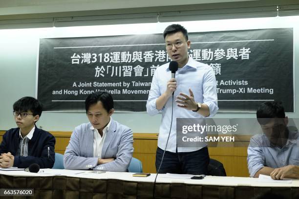 Taiwan's "Sunflower Movement" leader Li Fei-fan speaks alongside Hong Kong's pro-democracy activist Joshua Wong , Taiwan's New Power Party chairman...