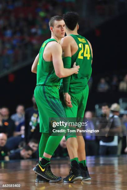 Casey Benson and Dillon Brooks of the Oregon Ducks react in the second half against the North Carolina Tar Heels during the 2017 NCAA Men's Final...