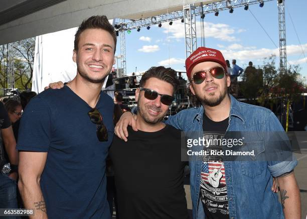 Musicians Eric Gunderson Love and Theft, DJ DU and Stephen Barker Liles of Love and Theft at the ACM Party For A Cause: Tailgate Party on April 1,...