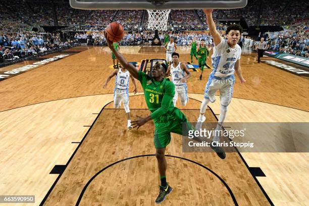 Dylan Ennis of the Oregon Ducks takes a shot during the 2017 NCAA Photos via Getty Images Men's Final Four Semifinal against the North Carolina Tar...