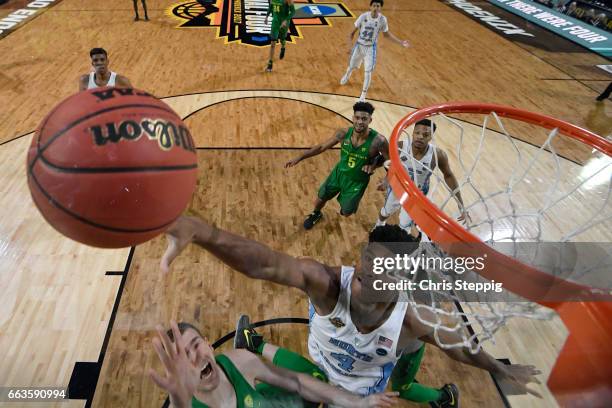 Kennedy Meeks of the North Carolina Tar Heels reaches for a rebound during the 2017 NCAA Photos via Getty Images Men's Final Four Semifinal against...