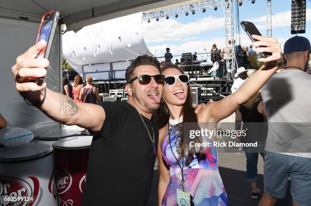 Record prodcer DJ DU and singer Jessa at the ACM Party For A Cause: Tailgate Party on April 1, 2017 in Las Vegas, Nevada.