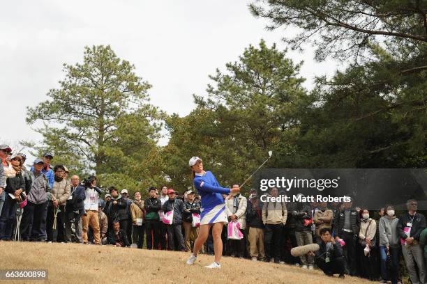 Ayaka Watanabe of Japan hits her second shot out of the rough on the ninth hole during the final round of the YAMAHA Ladies Open Katsuragi at the...