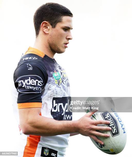 Mitchell Moses of the Tigers prepares during warm up before the round five NRL match between the Wests Tigers and the St George Illawarra Dragons at...