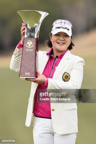 Min-Young Lee of Korea holds the winners trophy after the final round of the YAMAHA Ladies Open Katsuragi at the Katsuragi Golf Club Yamana Course on...