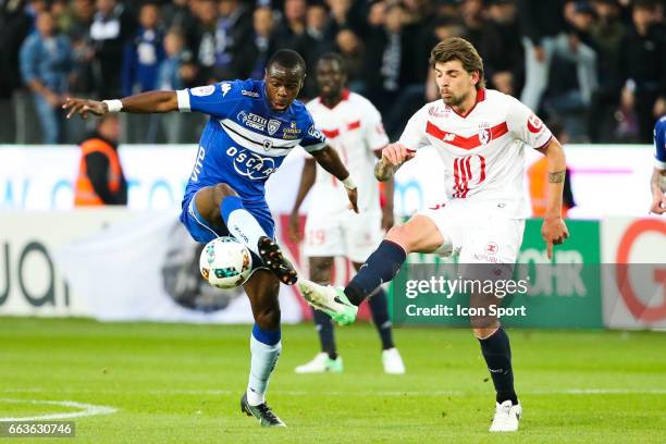 Prince Oniangue of Bastia and Xeka of Lille during the French Ligue 1 match between Bastia and Lille at Stade Armand Cesari on April 1, 2017 in...