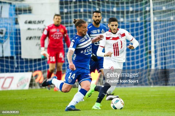 Mehdi Mostefa of Bastia and Yassine Benzia of Lille during the French Ligue 1 match between Bastia and Lille at Stade Armand Cesari on April 1, 2017...