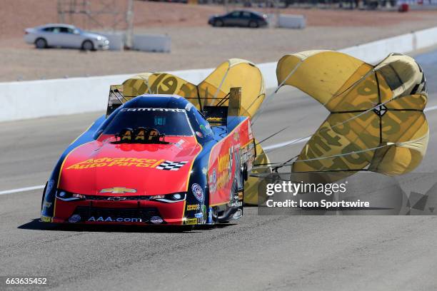 Courtney Force John Force Racing Chevrolet Camaro SS NHRA Funny Car deploys a parachute during the NHRA DENSO Spark Plugs NHRA Nationals on April 01,...