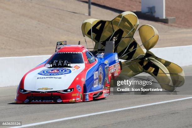 Robert Hight John Force Racing Chevrolet Camaro SS NHRA Funny Car deploys a parachute during the NHRA DENSO Spark Plugs NHRA Nationals on April 01,...
