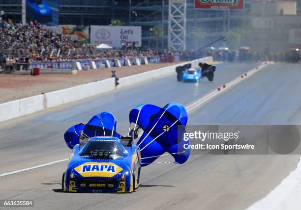 Ron Capps Don Schumacher Racing Dodge Charger NHRA Funny Car deploys a parachute during the NHRA DENSO Spark Plugs NHRA Nationals on April 01, 2017...