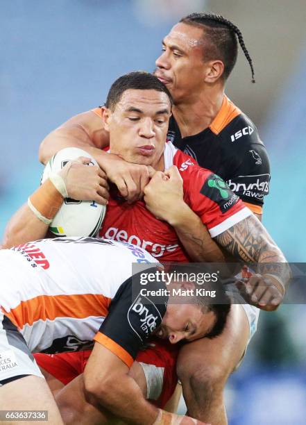 Tyson Frizell of the Dragons is tackled during the round five NRL match between the Wests Tigers and the St George Illawarra Dragons at ANZ Stadium...