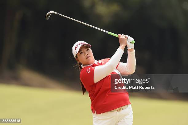 Sun-Ju Ahn of Korea plays her approach shot on the third hole during the final round of the YAMAHA Ladies Open Katsuragi at the Katsuragi Golf Club...