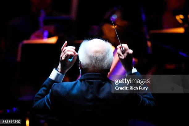 Composer John Williams performs at Mancini Delivered - A Musical Tribute To Ginny And Henry Mancini at Wallis Annenberg Center for the Performing...