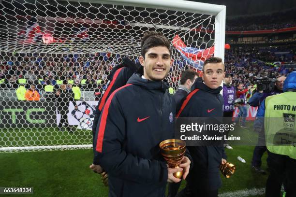 Goncalo Guedes and Giovani Lo Celso of Paris Saint-Germain celebrate the cup after the French League Cup Final match between Paris Saint-Germain and...