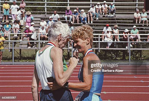 Post-race congratulations amongst the medalists at the National Senior Games, or Senior Olympics in Syracuse, New York, July 1991.