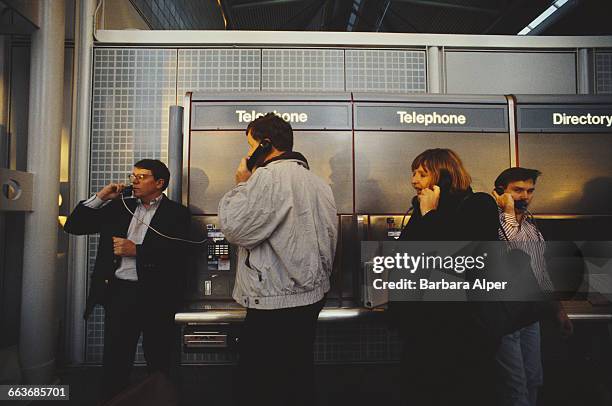 Public phonebooths at LaGuardia Airport, New York City, November 1994.
