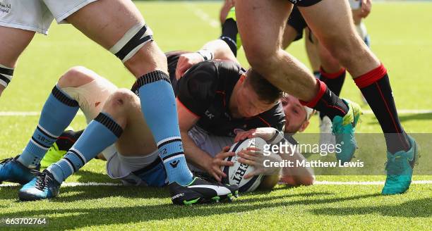 Chris Ashton of Saracens scores a try during the European Rugby Champions Cup match between Saracens and Glasgow Warriors at Allianz Park on April 2,...