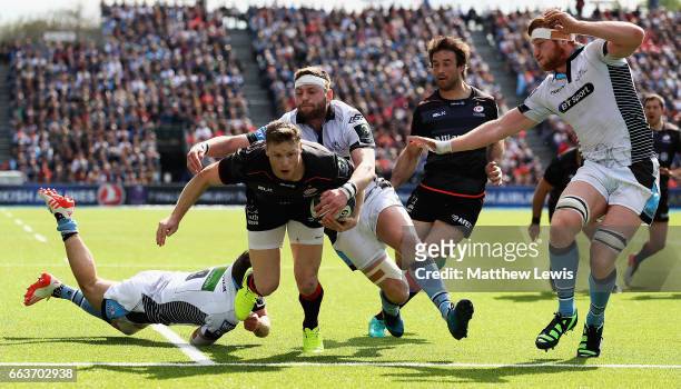 Chris Ashton of Saracens breaks clear to score a try during the European Rugby Champions Cup match between Saracens and Glasgow Warriors at Allianz...