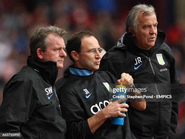 Aston Villa manager Martin O'Neill with his firrst team coach Steve Walford and assistant manager John Robertson on the touchline.