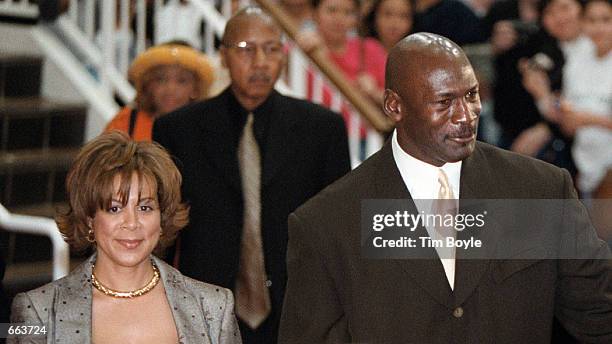 Basketball legend Michael Jordan and his wife Juanita arrive for the world premier of the IMAX movie "Michael Jordan To The Max" May 4, 2000 at...