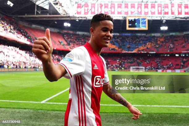 Justin Kluivert of AFC Ajax celebrates at full-time following the Eredivisie match between AFC Ajax and Feyenoord at Amsterdam Arena on April 2, 2017...