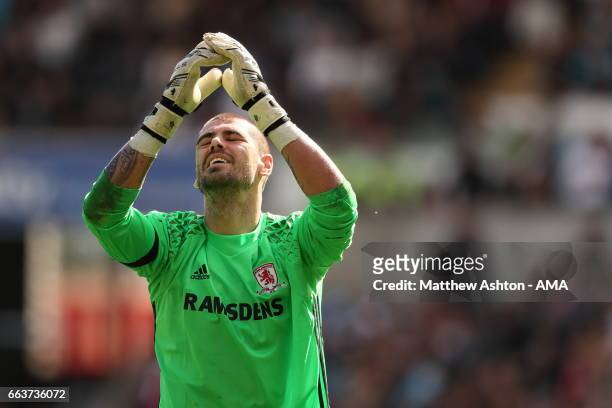 Goalkeeper Víctor Valdes of Middlesbrough reacts after Rudy Gestede failed to score the winning goal in the last minute during the Premier League...