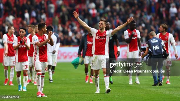 Justin Kluivert and Joel Veltman of Ajax celebrate victory after the Dutch Eredivisie match between Ajax Amsterdam and Feyenoord at Amsterdam ArenA...