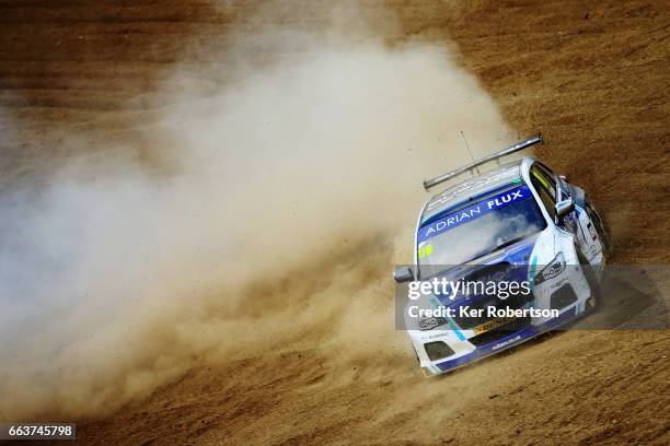 Ashley Sutton of Adrian Flux Subaru Racing slides off into the gravel at Paddock Hill Bend during the Dunlop MSA British Touring Car Championship at...