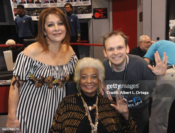 Actresses Marina Sirtis, Nichelle Nichols and CEO of the Sci-Fi Hollywood Museum Huston Huddleston of 'Star Trek' sign autographs at the Sci-Fi...