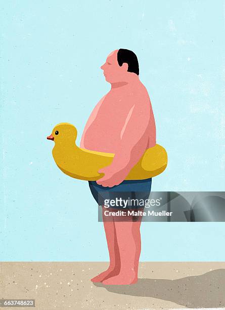 side view of man wearing inflatable rubber duck ring at beach - holiday stock illustrations