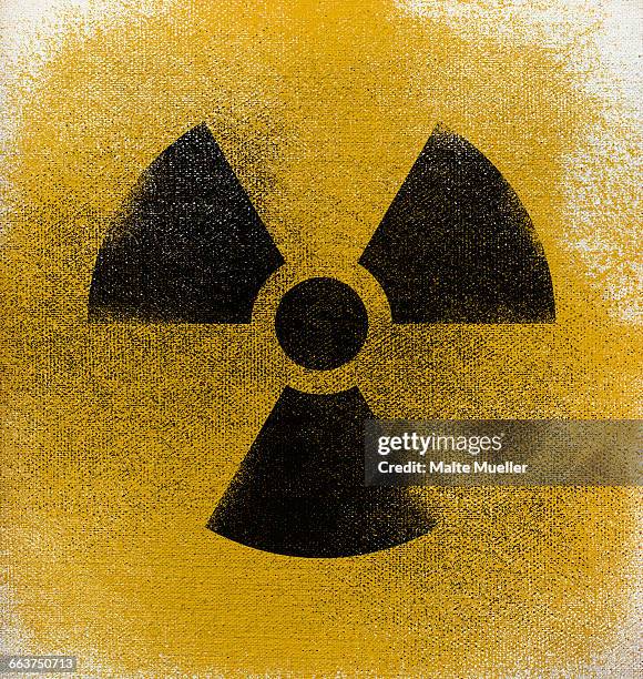 close-up of radioactive warning symbol - radiation symbol stock illustrations