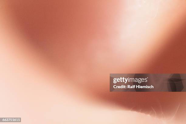 extreme close-up of womans ear - ear close up women stock-fotos und bilder