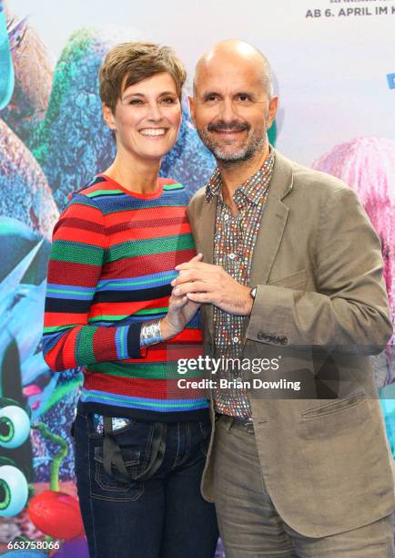 Christoph Maria Herbst and wife Gisi Herbst arrive at the "Die Schluempfe - Das verlorene Dorf' Berlin premiere at Sony Centre on April 2, 2017 in...