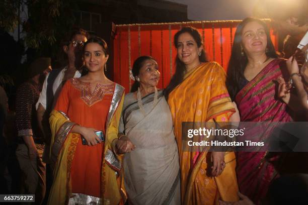 Bollywood actor Shraddha Kapoor, Padmini Kolhapure, Rashmi Thackeray, and singer Asha Bhosale during the opening of Pandit Pandharinath Kolhapure...