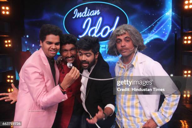 Contestants PVNS Rohit, Khuda Baksh, LV Revanth along with Bollywood actor Sunil Grover on the sets of Indian Idol season 9, on March 31, 2017 in...