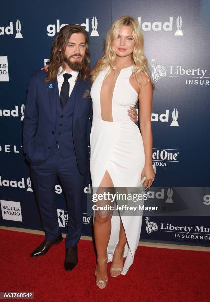 Actor Tom Payne and model Jennifer Akerman attend the 28th Annual GLAAD Media Awards in LA at The Beverly Hilton Hotel on April 1, 2017 in Beverly...