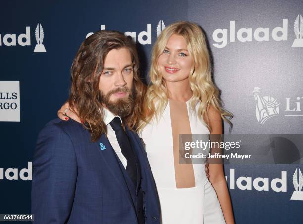 Actor Tom Payne and model Jennifer Akerman attend the 28th Annual GLAAD Media Awards in LA at The Beverly Hilton Hotel on April 1, 2017 in Beverly...