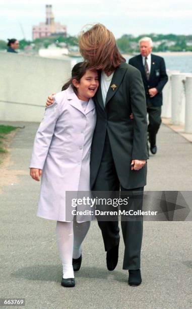 Caroline Kennedy Schlossberg hugs daughter Tatiana Schlossberg outside the JFK Library after handing out the John F. Kennedy Profile in Courage Award...