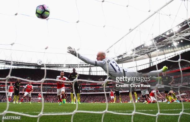 Shkodran Mustafi of Arsenal scores his sides second goal past Willy Caballero of Manchester City during the Premier League match between Arsenal and...