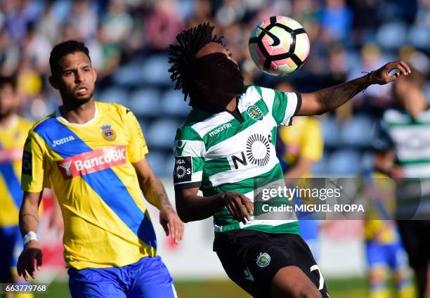 Sporting's forward Gelson Martins vies with Arouca's Brazilian defender Vitor Costa during the Portuguese league football match Arouca FC vs Sporting...