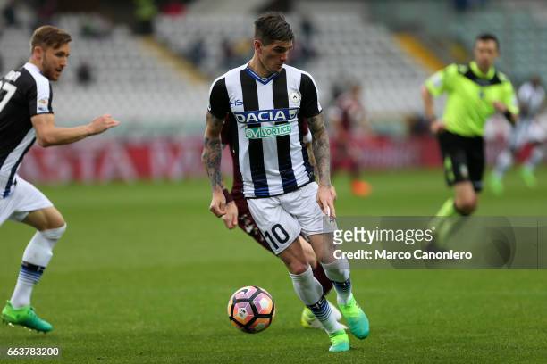Rodrigo De Paul of Udinese in action during the Serie A football match between Torino FC and Udinese . Final result is 2-2.