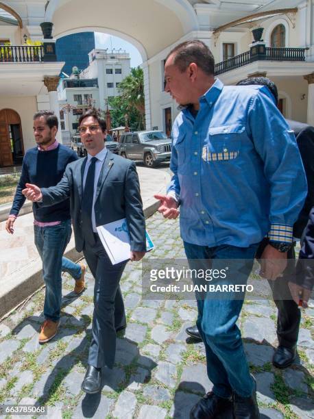 The first vice president of Venezuela's National Assembly Freddy Guevara speaks with Venezuelan opposition deputy Richard Blanco before a press...