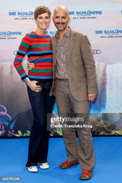 Christoph Maria Herbst and his wife Gisi Herbst attend 'Die Schluempfe - Das verlorene Dorf' Berlin Premiere at Sony Centre on April 2, 2017 in...