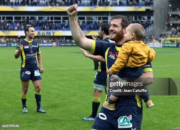 Camille Lopez of ASM Clermont celebrates with his son Victor Lopez the victory while Morgan Parra looks on following the European Rugby Champions Cup...