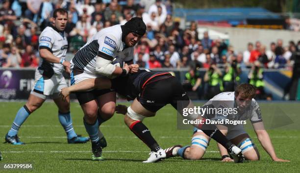 Zander Fagerson of Glasgow is tackled by Jackson Wray during the European Rugby Champions Cup match between Saracens and Glasgow Warriors at the...