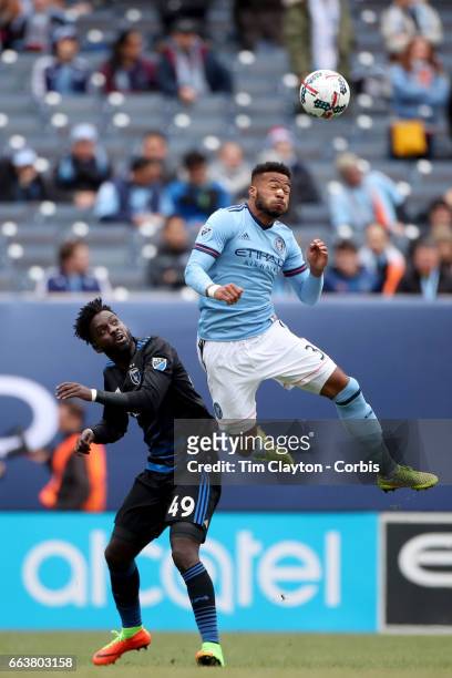 April 12: Ethan White of New York City FC heads clear from Simon Dawkins of San Jose Earthquakes during the New York City FC Vs San Jose Earthquakes...