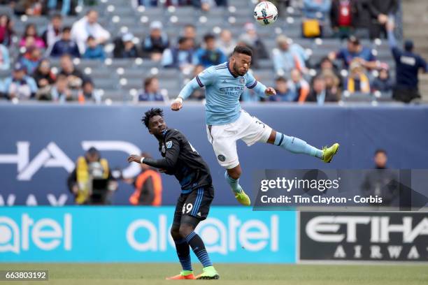 April 12: Ethan White of New York City FC heads clear from Simon Dawkins of San Jose Earthquakes during the New York City FC Vs San Jose Earthquakes...