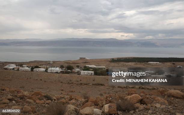 Picture taken on April 2, 2017 show the Israeli settlement of Ovnat located on the shore of the Dead Sea in the Judaean desert in the...