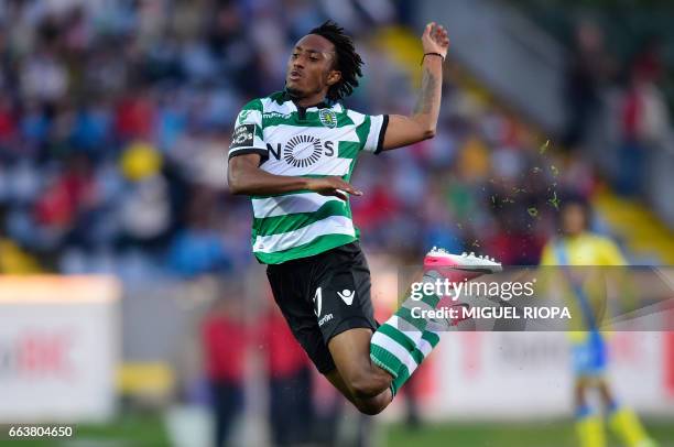 Sporting's forward Gelson Martins falls on the field during the Portuguese league football match Arouca FC vs Sporting CP at the Arouca Municipal...