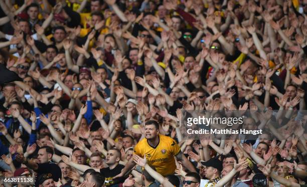 The fans of Dynamo Dresden seen during the Second Bundesliga match between VfB Stuttgart and Dynamo Dresden at Mercedes-Benz Arena on April 2, 2017...